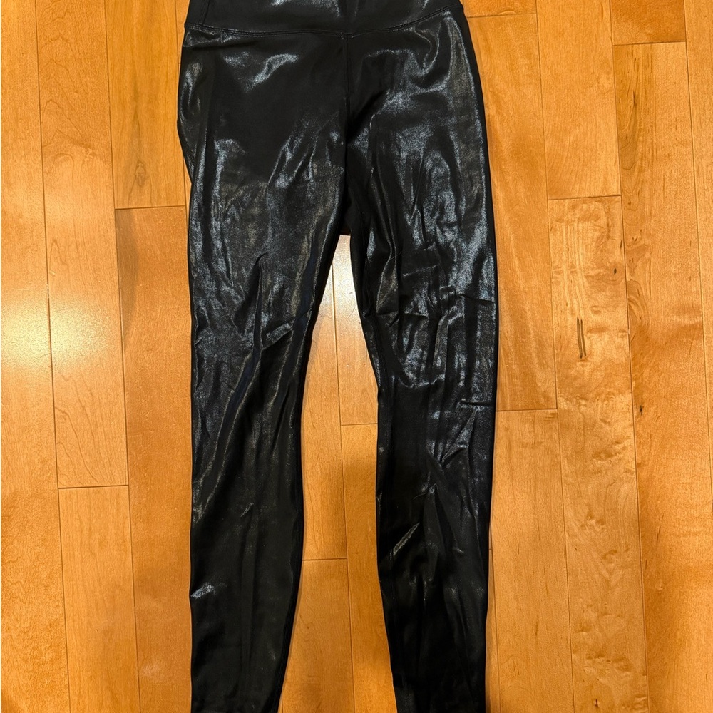 Athleta “Gleam” line Black leggings with slick, faux leather look.XS, like new!